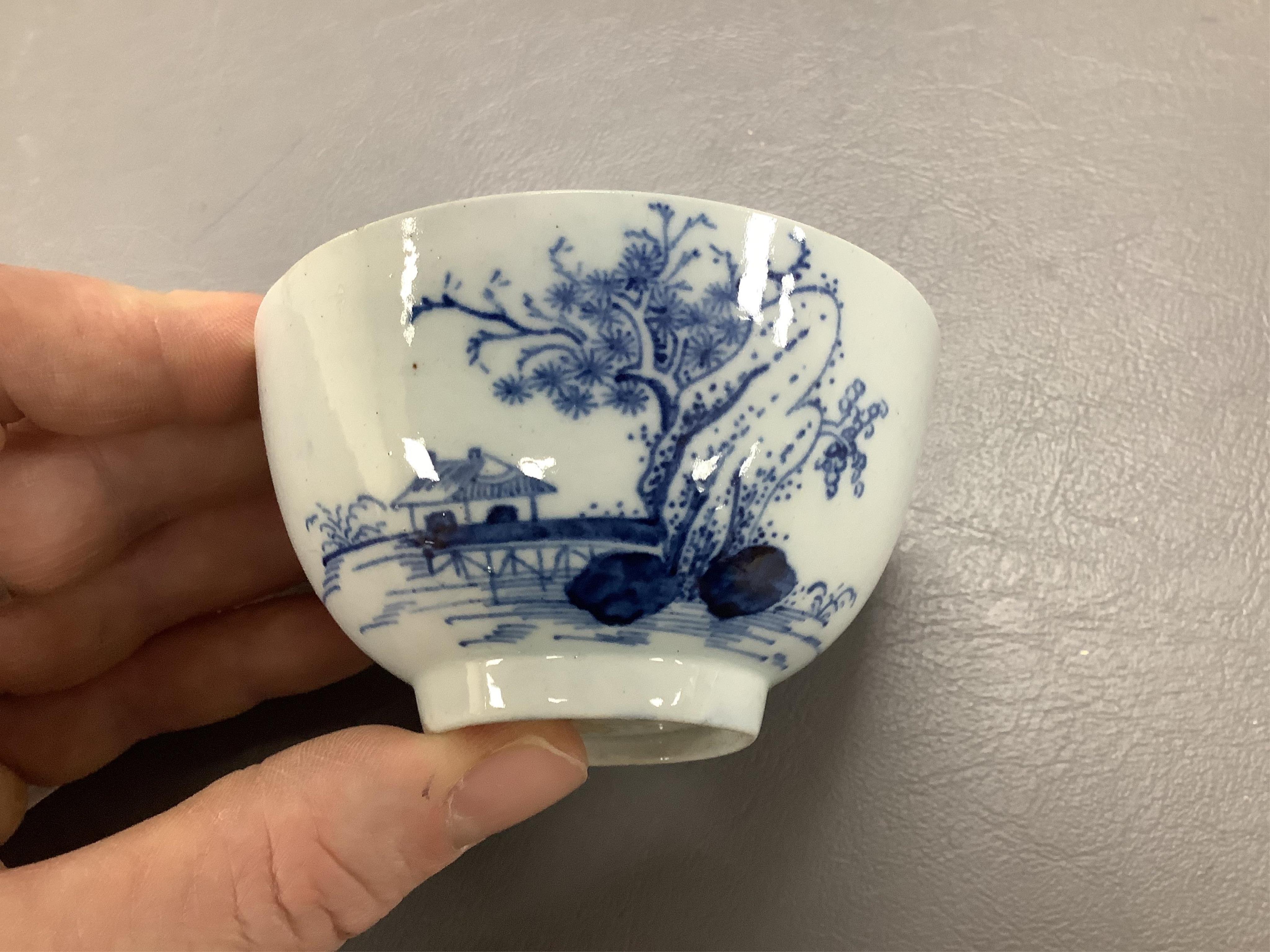 A group of 18th century Worcester and Liverpool porcelain teaware and a Caughley Cormorant fisherman butter tub and cover.
